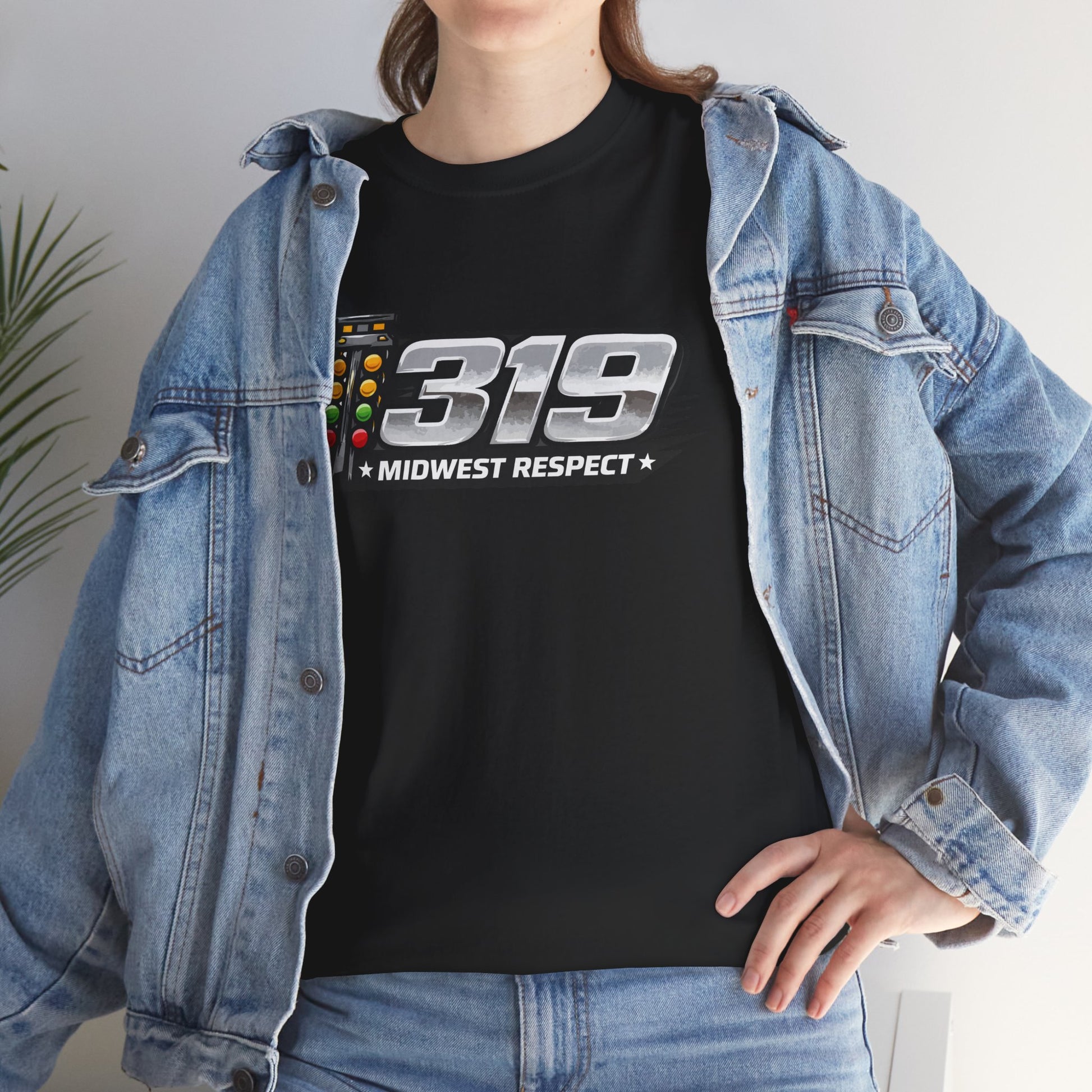 Person wearing a black t-shirt with '319 Midwest Respect' design and a denim jacket.