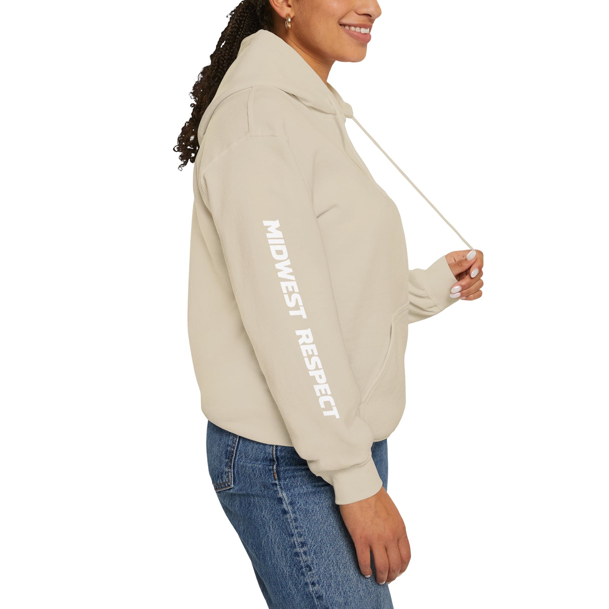 Person wearing a beige hoodie with a logo on a white background