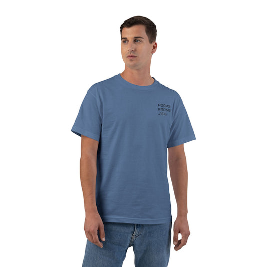 Man wearing a blue t-shirt and jeans on a white background