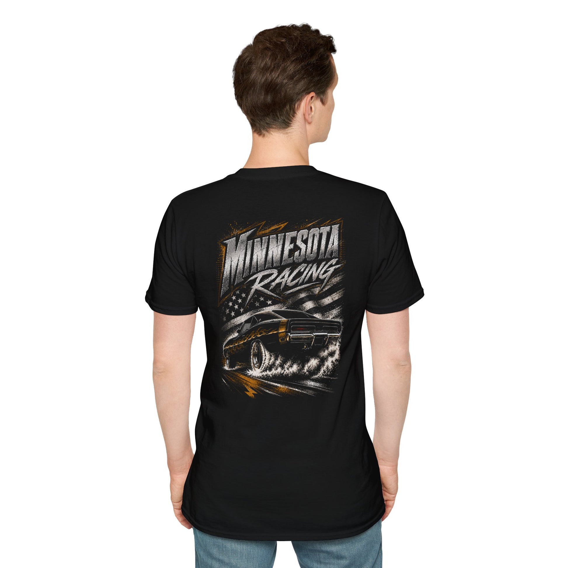 A man viewed from the back wearing a black short-sleeve t-shirt with a large 'Minnesota Racing' graphic on the back, paired with blue jeans, against a plain white background.