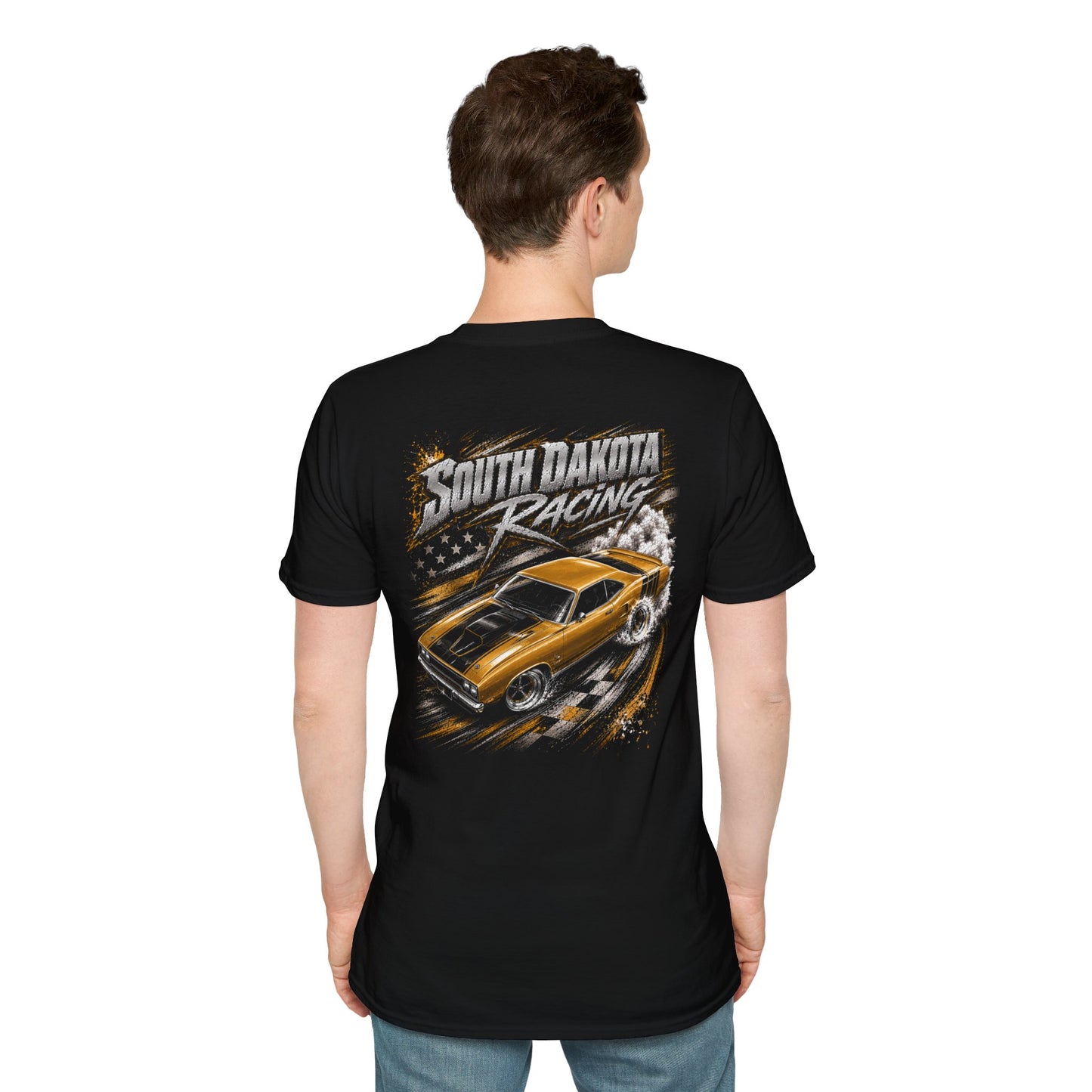 A man viewed from the back wearing a black short-sleeve t-shirt with a large graphic print on the back. The graphic features the text 'South Dakota Racing' above an illustration of a yellow and black muscle car drifting, with smoke and a checkered flag motif.