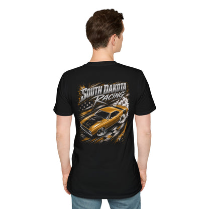 A man viewed from the back wearing a black short-sleeve t-shirt with a large graphic print on the back. The graphic features the text 'South Dakota Racing' above an illustration of a yellow and black muscle car drifting, with smoke and a checkered flag motif.