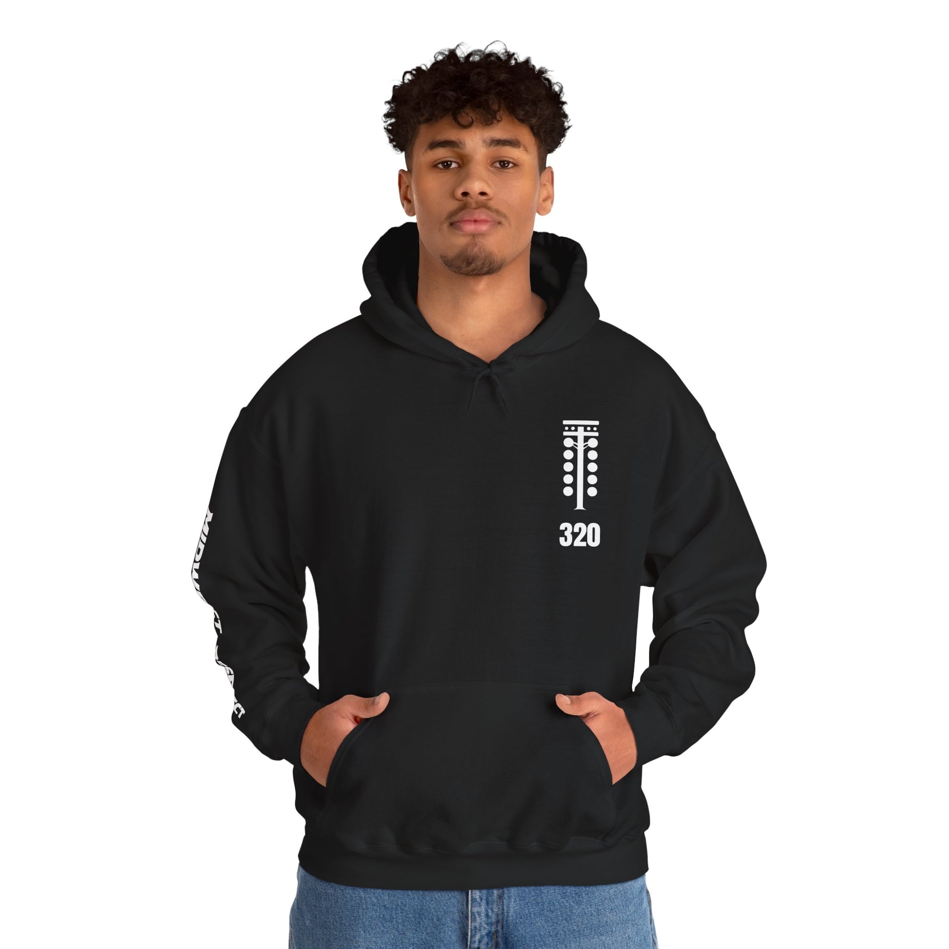 Man wearing a black hoodie with white text on a white background
