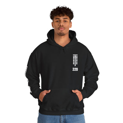 Man wearing a black hoodie with white text on a white background