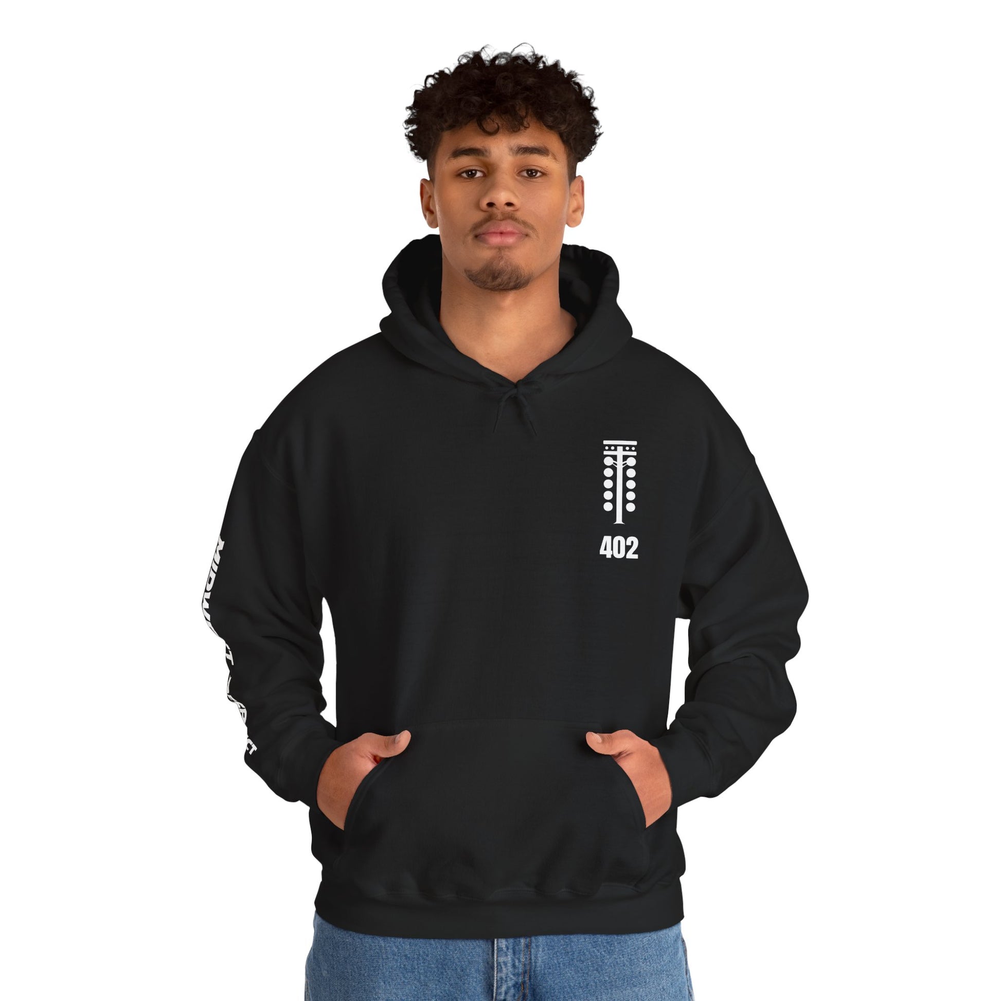 Person wearing a black hoodie with a logo and text on a white background