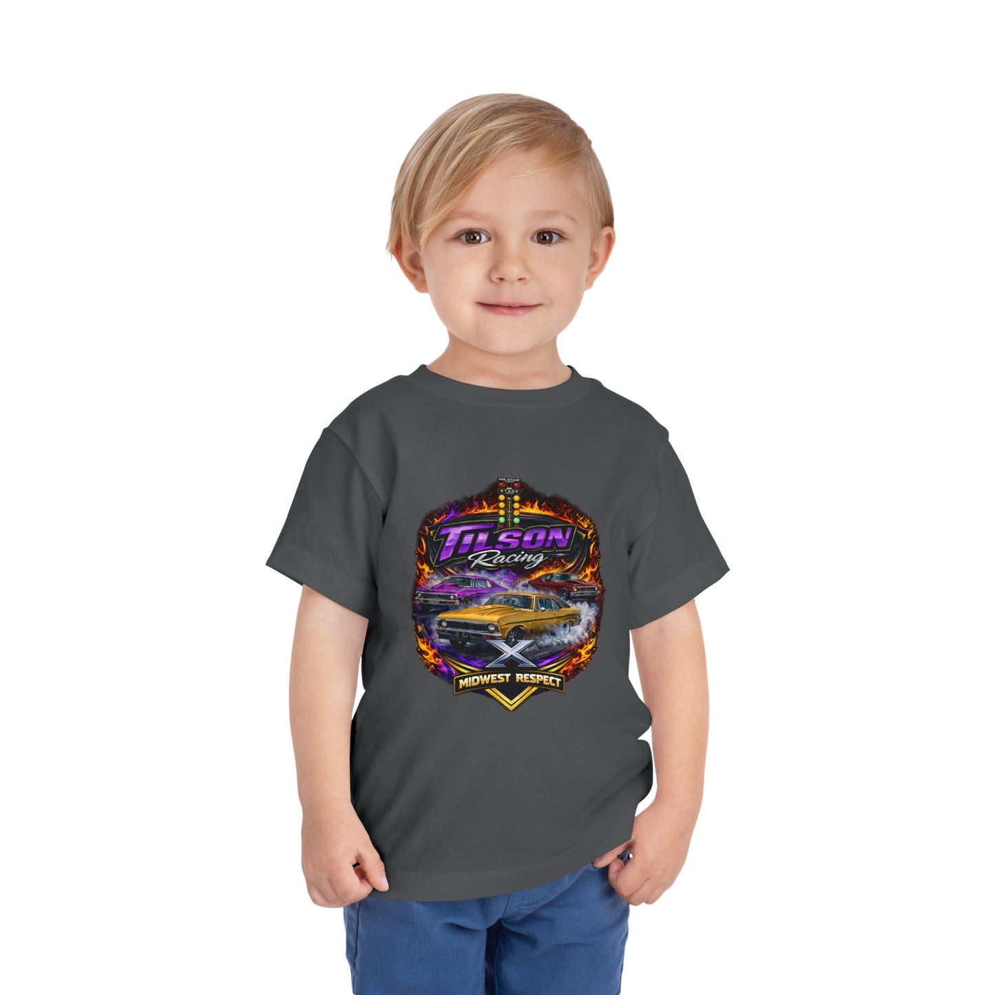 Child wearing a dark gray t-shirt with a colorful graphic design on a white background
