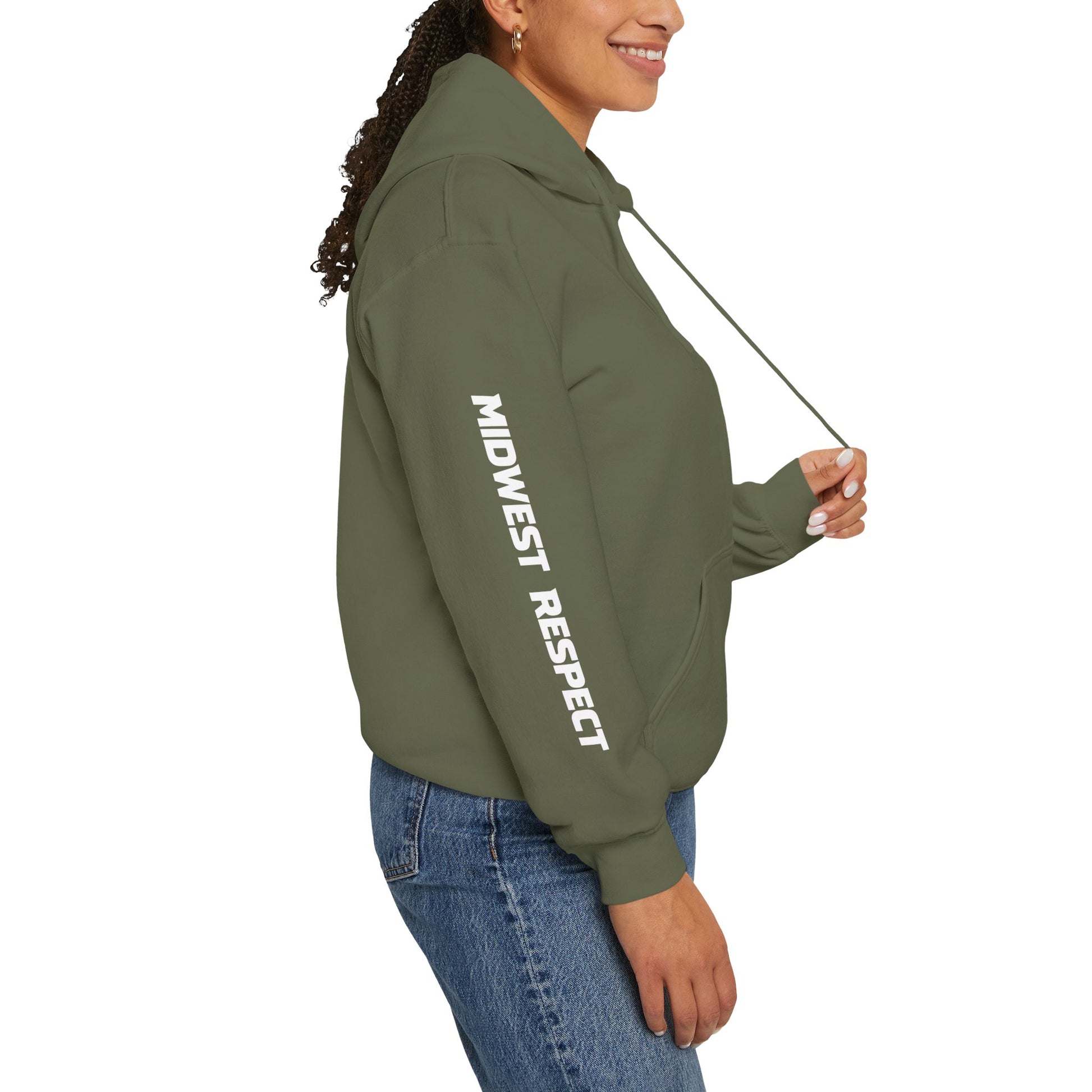 Person wearing a green hoodie with a lettering on a white background