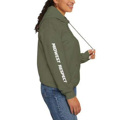 Person wearing a green hoodie with a lettering on a white background