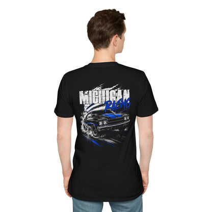 A man viewed from the back wearing a black short-sleeve t-shirt with a large 'MICHIGAN RACING' graphic on the back, featuring a blue and white car illustration. He is standing against a plain white background.