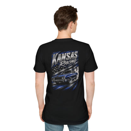 A man viewed from the back wearing a black short-sleeve t-shirt with a large 'Kansas Racing' graphic on the back, featuring a blue muscle car and a checkered flag design.