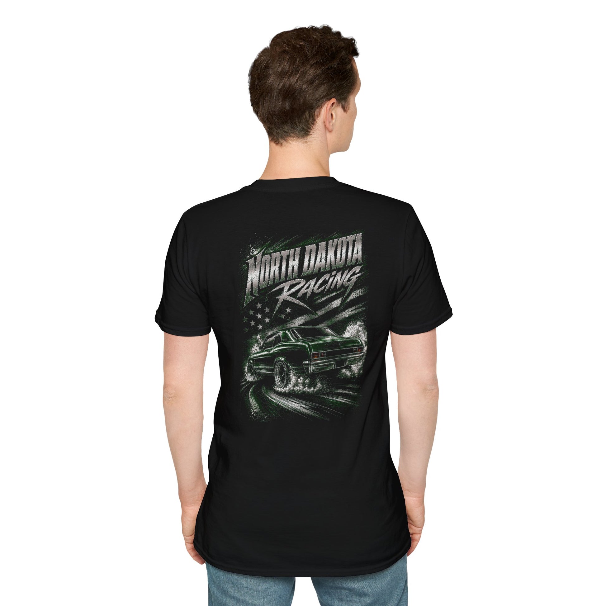 A man viewed from the back wearing a black short-sleeve t-shirt with a large 'North Dakota Racing' graphic on the back, paired with blue jeans, against a plain white background.