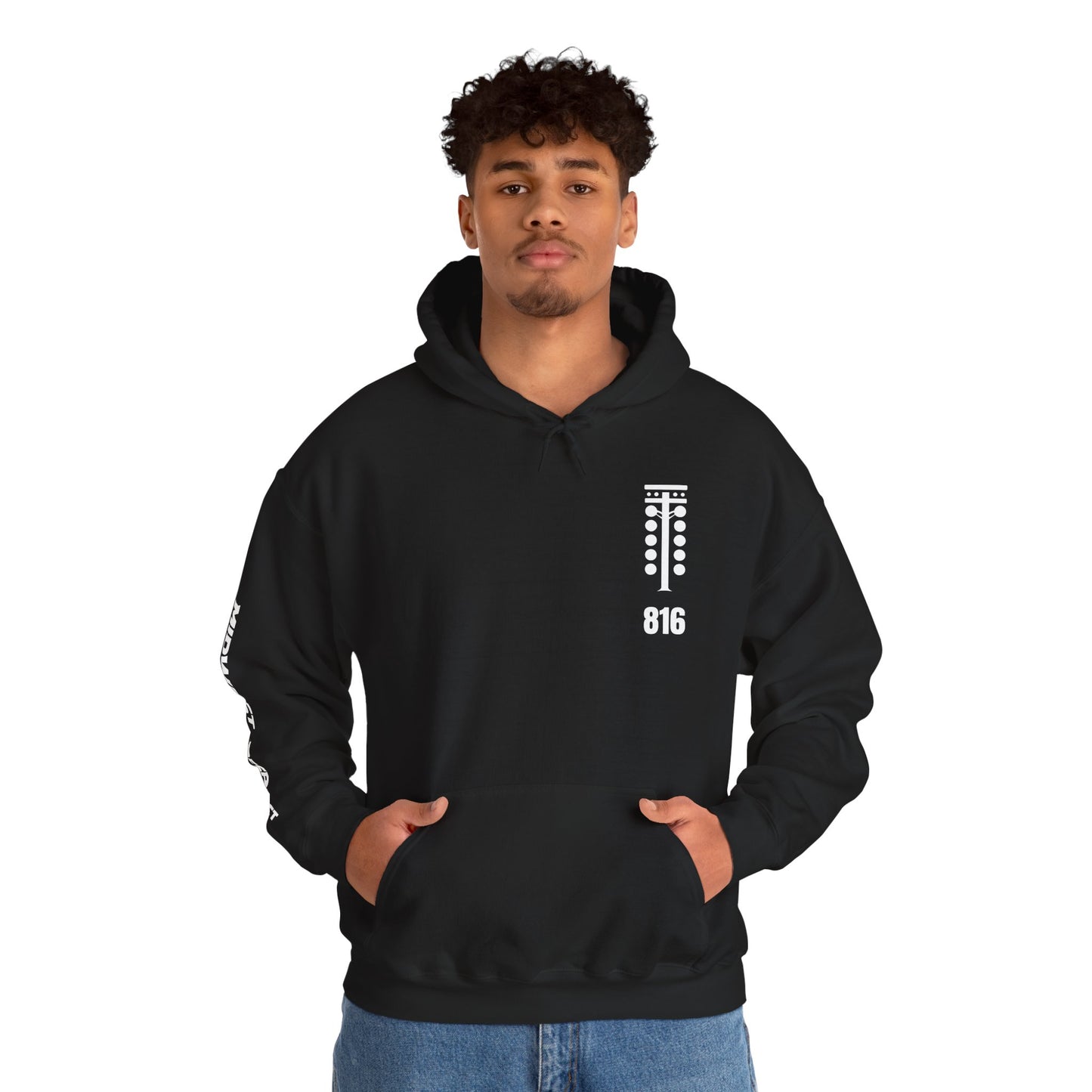 Person wearing a black hoodie with a logo and text on a white background