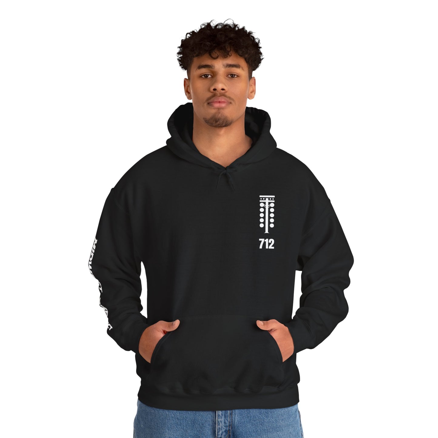 Person wearing a black hoodie with a logo and text on a white background