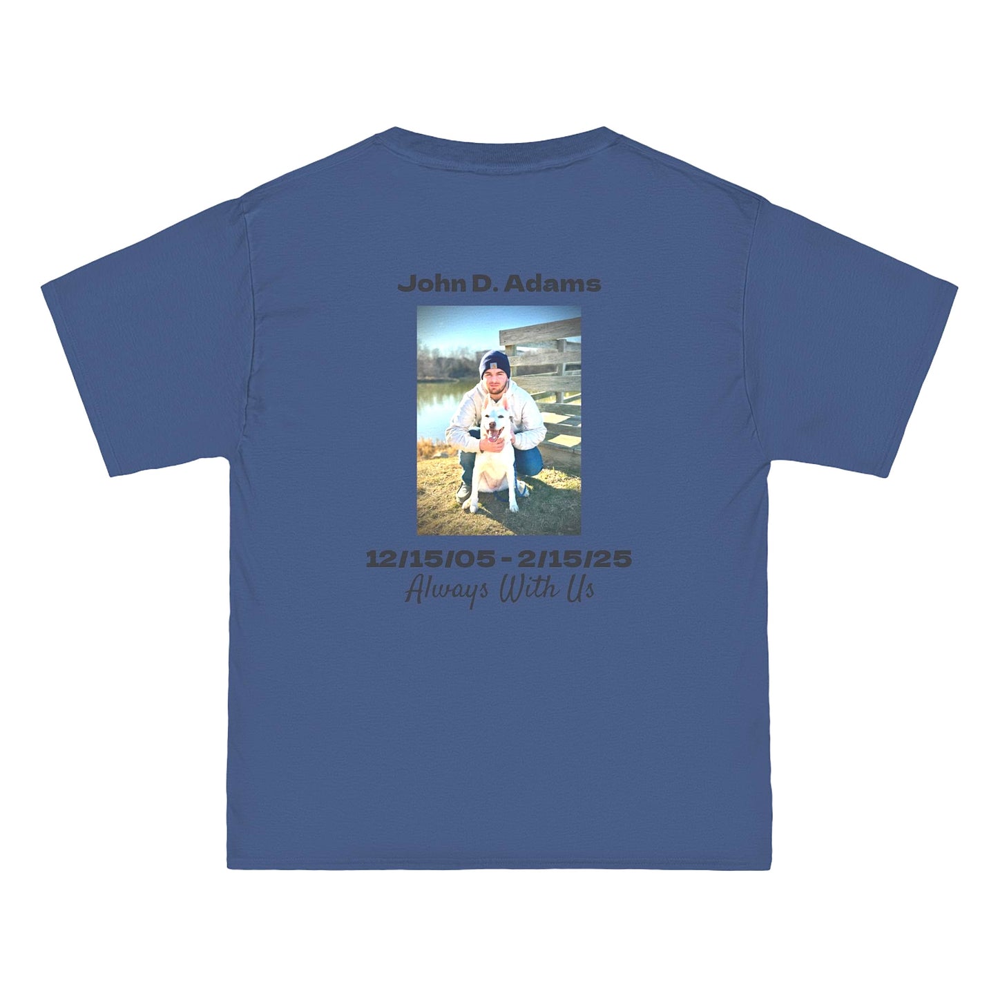 Blue t-shirt with a photo and text of a person and dog, along with dates and name on a white background.