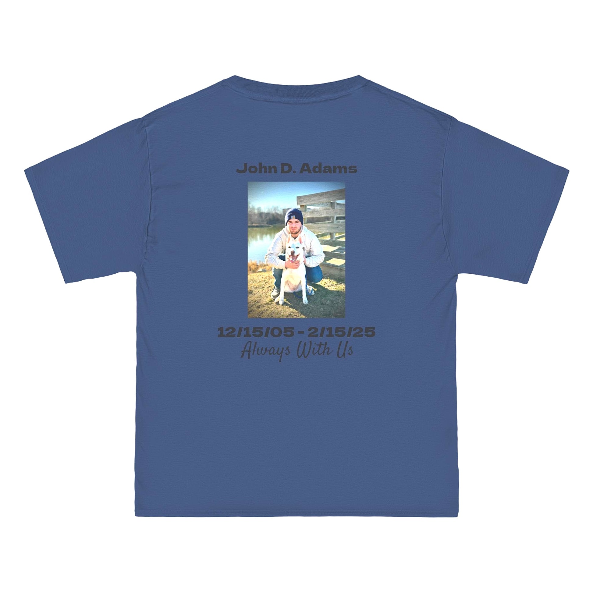 Blue t-shirt with a photo and text of a person and dog, along with dates and name on a white background.