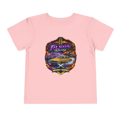 Pink t-shirt with a colorful graphic design featuring a car and text on a white background