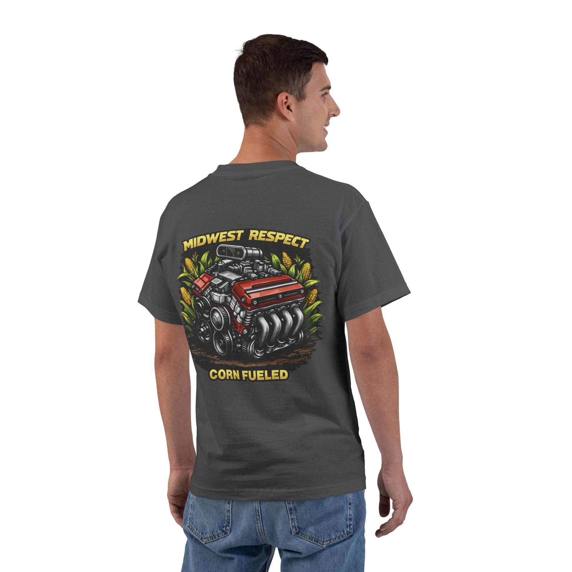 Man wearing a gray t-shirt with a graphic design on the back, featuring an engine and text.