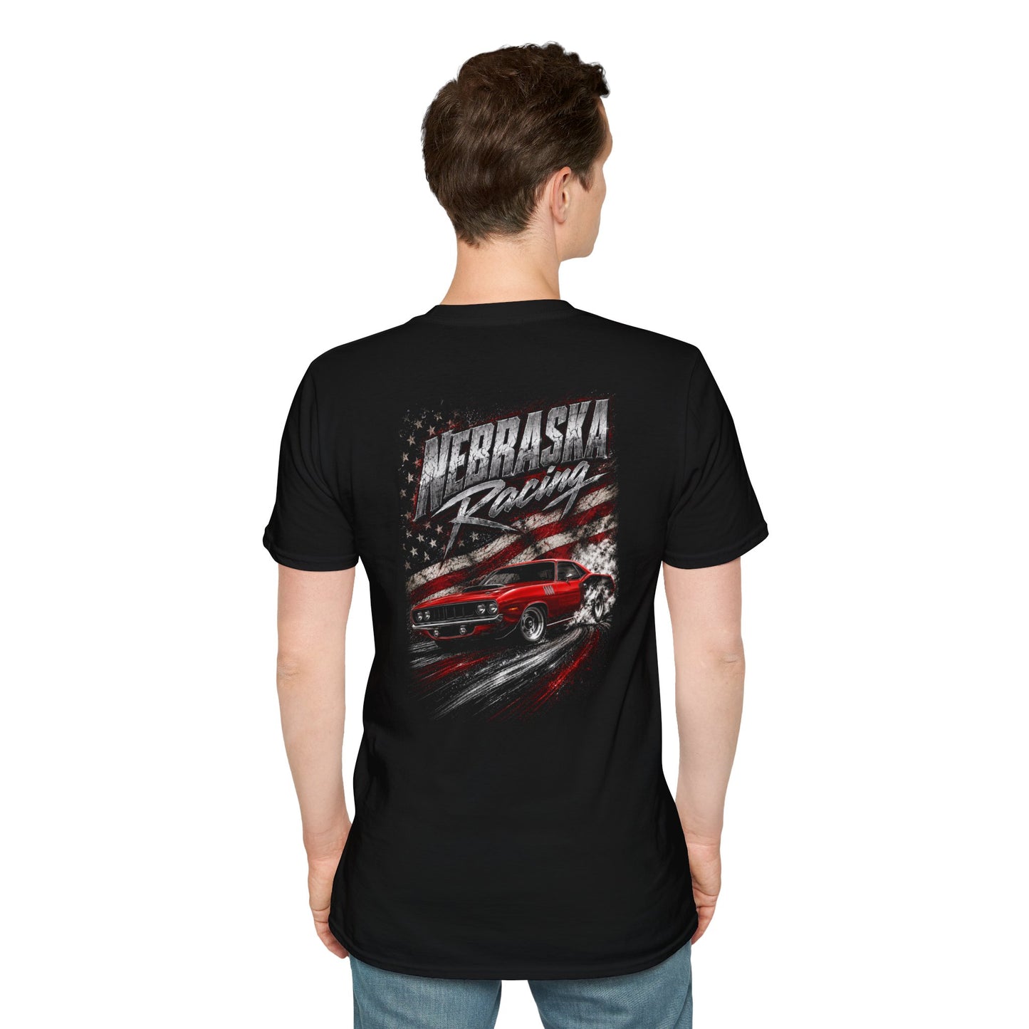 A man viewed from the back wearing a black t-shirt with a large graphic on the back featuring the text 'Nebraska Racing' and a red muscle car over an American flag design.