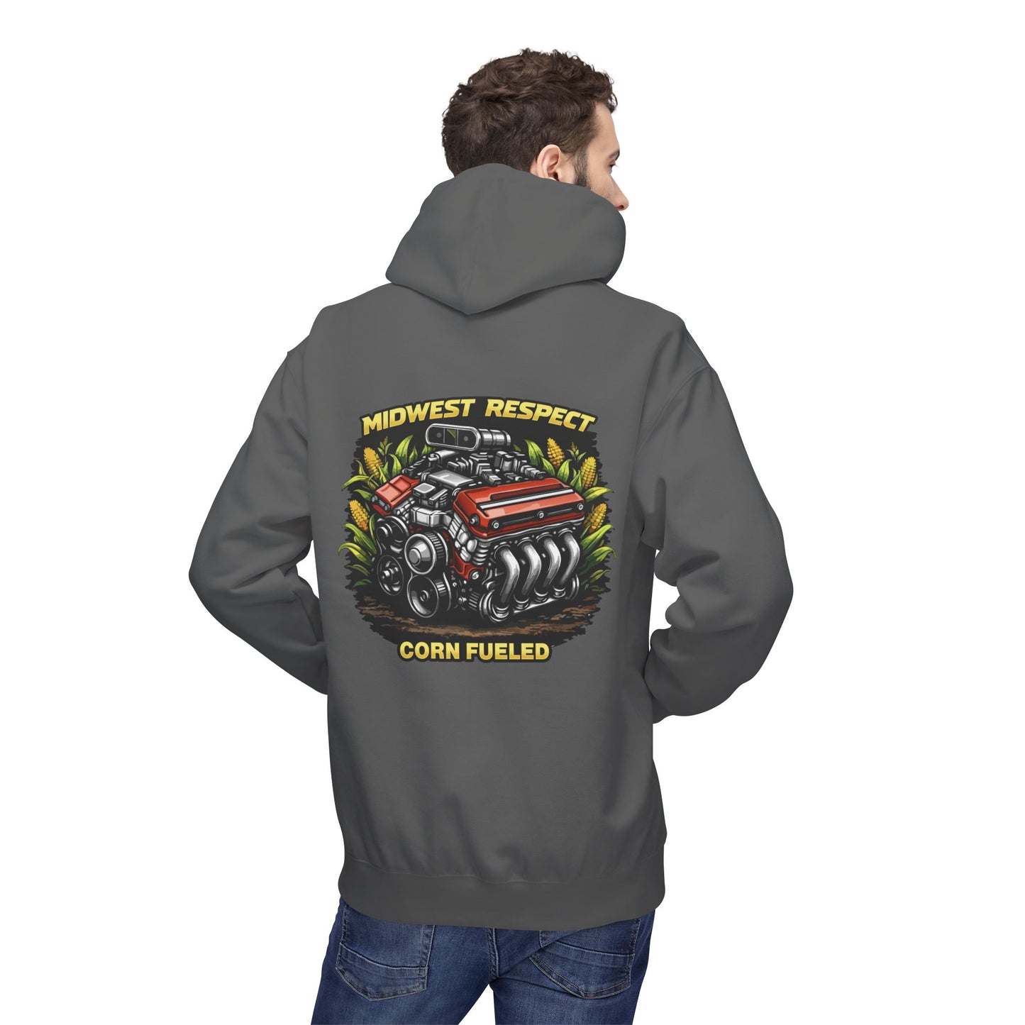 Person wearing a gray hoodie with a graphic design on the back, featuring an engine and text.