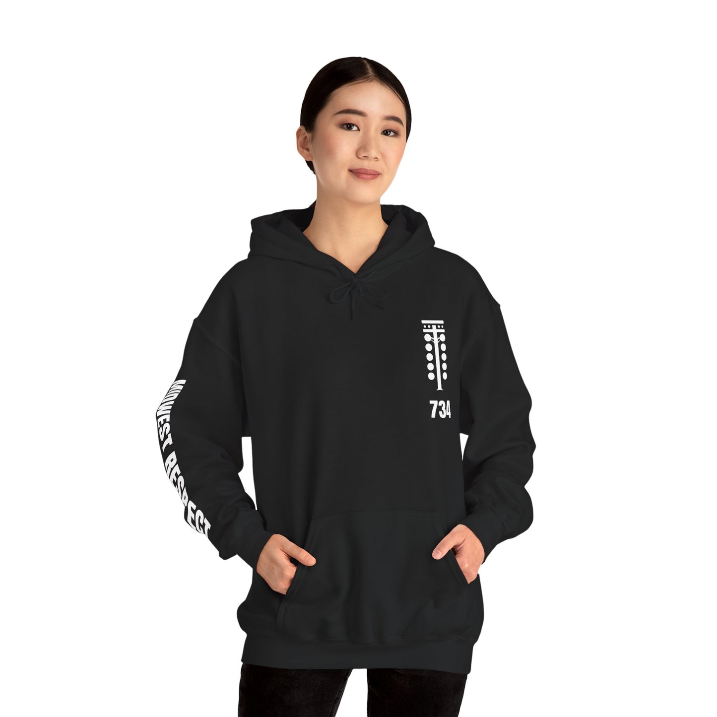 Person wearing a black hoodie with white text on a white background