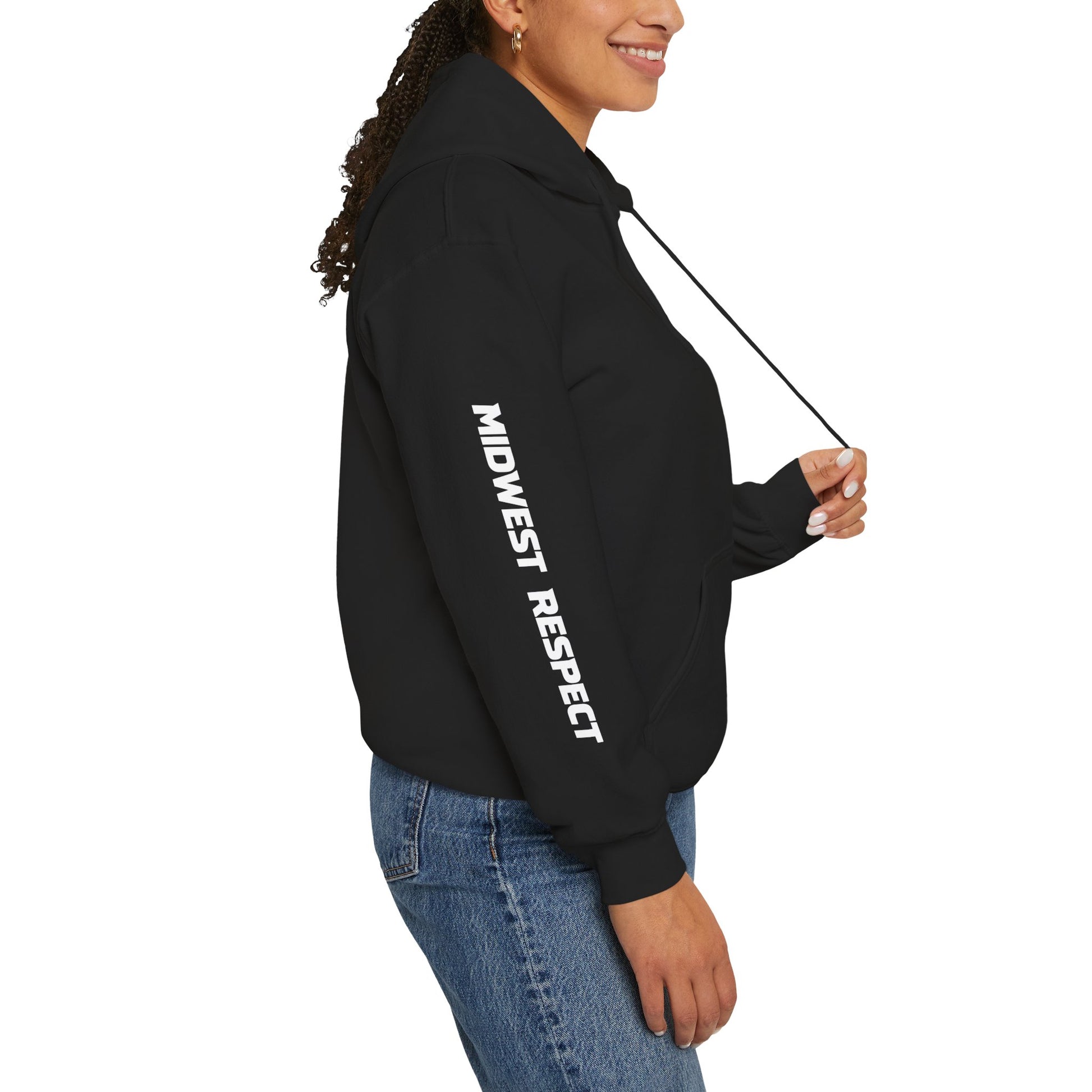 Person wearing a black hoodie with text on a white background