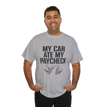 Man wearing a gray t-shirt with text 'My car ate my paycheck' on a white background